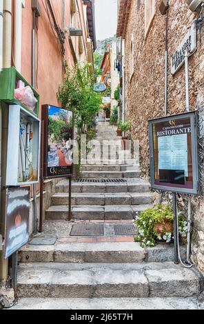 TAORMINA, ITALY - AUGUST 11, 2021: Walking in the picturesque streets of Taormina, Sicily, Italy Stock Photo