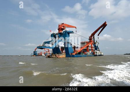 Mongla. 28th Apr, 2022. Photo taken on April 12, 2022 shows a dredging site in Mongla seaport of Bangladesh. TO GO WITH 'Feature: Bangladesh port rejuvenated by Chinese dredging' Credit: Xinhua/Alamy Live News Stock Photo