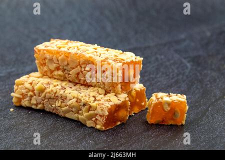 Turkish Delight with Orange. Hazelnut coated Turkish delight. Traditional Turkish cuisine delicacies. close up Stock Photo