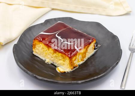 Trilece dessert with caramel on a white background. World cuisine desserts. close up Stock Photo