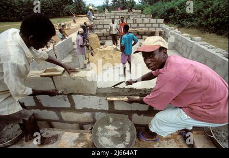 Ghana, Accra; men working in a housing construction project. Stock Photo