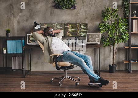 Full size photo of guy administrator sit chair nap dream after night shift server testing hands head in workforce Stock Photo