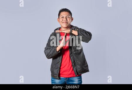 Man making time out gesture, latin guy making time out gesture Stock Photo