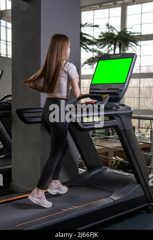 Treadmill woman length indoors young profile full exercise sport, for lifestyle attractive in person and adult recreation, sportswoman together Stock Photo