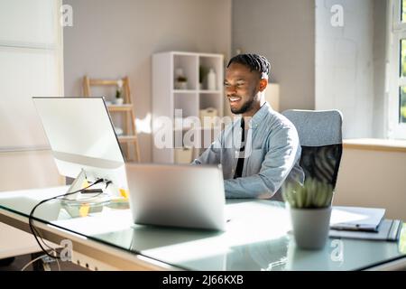 Man At Workplace. Manager Doing Business Communication In Office Stock Photo