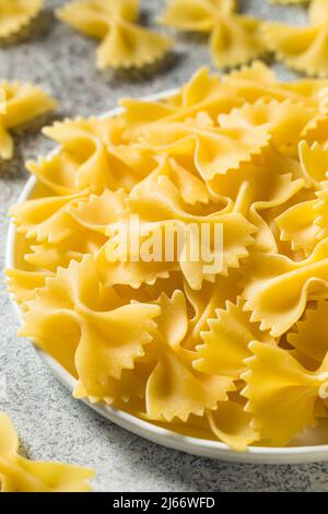 Dry Italian Bow Tie Farfalle Pasta Ready to Cook Stock Photo