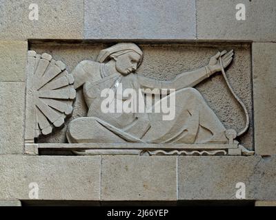 12 17 2020 Art Deco Woman sculpture of Charkha or spring wheel working on new india assurance building Stock Photo