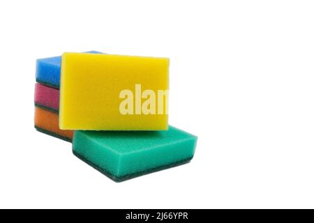 Multi-colored sponges for household work from foam rubber, stack, on a white background. Stock Photo