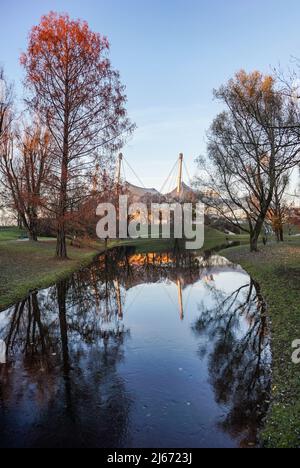 The famous roof of the Munich Olympic stadium designed by Behnisch and Frei Otto – Olympiapark und olympische Sportstätten in München Stock Photo
