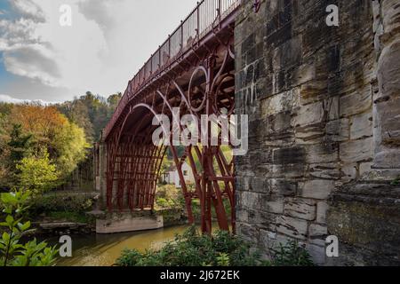 The Iron Bridge is a cast iron arch bridge that crosses the River Severn in Shropshire, England. Opened in 1781,The first major bridge from cast iron. Stock Photo