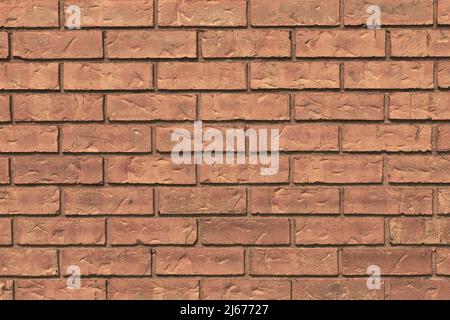 Close up of painted red brick wall texture background. Stock Photo