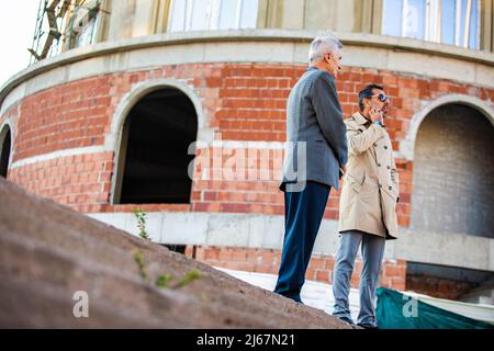 Amazing two senior businessmen are talking about the company new plans and ideas Stock Photo