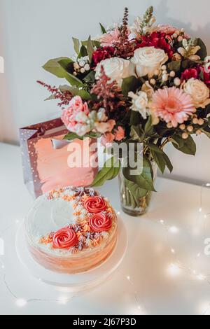 Anniversary and Valentines Day Gift, Homemade Classic Vanilla Marble Cream  Cake Sprinkled with Creamy Flowers Decorations on a White Plate, Birthday G Stock  Photo - Alamy