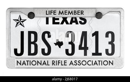 Texas license plate Texas number plate. Texas numberplate. NRA National Rifle Association Life Member chrome license plate frame. Stock Photo