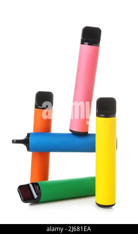 Different disposable electronic cigarettes on white background Stock Photo