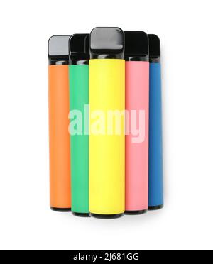 Different disposable electronic cigarettes on white background Stock Photo