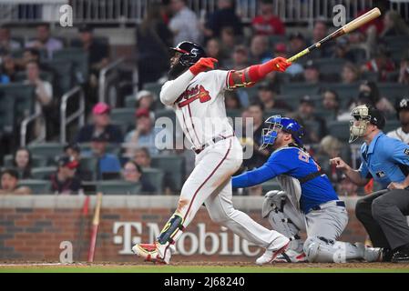 Atlanta, GA, USA. 09th Apr, 2022. Atlanta Braves outfielder Marcell Ozuna  hits a double during the third inning of a MLB game against the Cincinnati  Reds at Truist Park in Atlanta, GA.