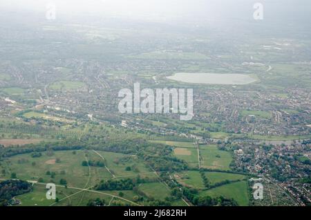 View from above looking across the historic Bushy Park in Hampton, across the River Thames towards Island Barn Reservoir in Molesey.  The landmark Ham Stock Photo