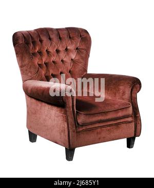 Comfortable upholstered red velvet vintage armchair with button back isolated on white Stock Photo