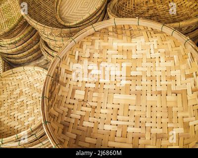 Detail of woven wicker baskets for sale at a street market in Asia Stock Photo