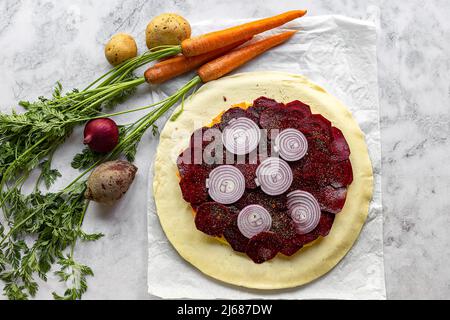 Step by step recipe of savory root vegetable galette. Step 5.  Stock Photo