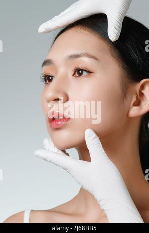 Young women to have plastic surgery Stock Photo