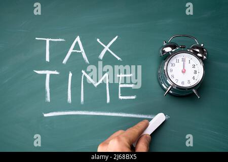 Alarmclock Tax Deadline Text. Account Audit Schedule Stock Photo