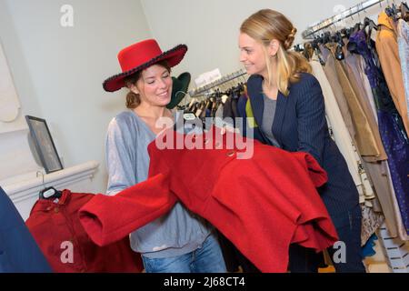 woman in costume department wearing mexican hat Stock Photo