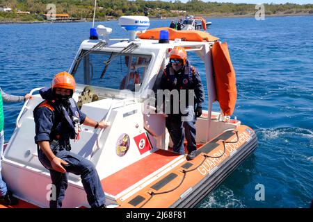 Vulcano, Sicily, April 9, Italian coast guard assets during an exercise in Vulcano island. Focus and detail on the embroidered patch of Italian coast guard on 2022. Stock Photo