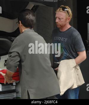 MIAMI BEACH, FL- SEPTEMBER 03: Boris Becker and wife Sharlely 'Lilly' Kerssenberg relax on holiday in Miami with their six-month-old baby Amadeus and Boris son Noah.  Lilly seemed to have lost all the weight she gained when pregnant with Amadeus who was born on February 9 earlier this year.   on September 3, 2010 in Miami Beach, Florida   People:  Boris Becker Stock Photo