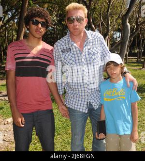 KEY BISCAYNE, FL - APRIL 02: (EXCLUSIVE COVERAGE)  Tennis great Boris Becker ( AKA Boris Franz Becker)  along with his two sons Elias Balthasar (b. 4-Sep-1999) and Noah Gabriel (b. 18-Jan-1994) in Key Biscayne after watching Rafael Nadal of Spain takes on Andy Roddick of the United States during day eleven of the 2010 Sony Ericsson Open at Crandon Park Tennis Center on April 2, 2010 in Key Biscayne, Florida.   People:  Boris Becker Noah Gabriel Elias Balthasar Stock Photo