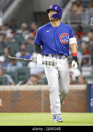 Seiya Suzuki of the Chicago Cubs hits a sacrifice fly in the first inning  of a baseball game against the Milwaukee Brewers on April 9, 2022, at  Wrigley Field in Chicago. (Kyodo)==Kyodo