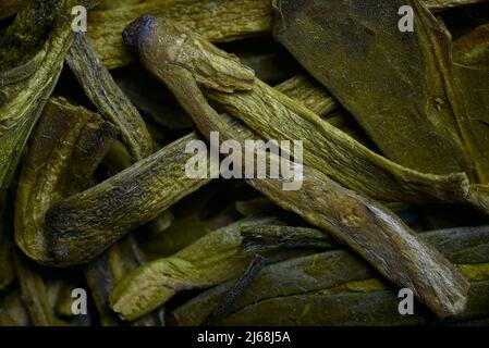 dry green tea leaves macro background Stock Photo