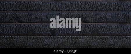 burnt wood background firewood pattern Stock Photo