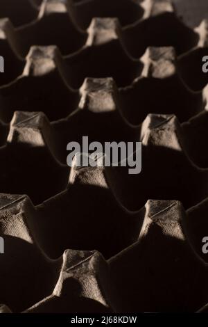 Abstract background. frame geometry. Egg packaging. Paper tray for domestic eggs. Beige and grey. Minimalism. Paper packaging egg carton Stock Photo