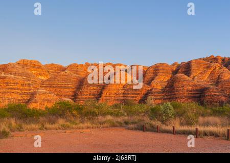 Stunning view of glowing sandstone karst domes at sunrise, Purnululu National Park or Bungle Bungles, a Unesco World Heritage site in the Kimberley, W Stock Photo