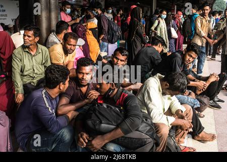 Dhaka, Bangladesh. 29th Apr, 2022. People wait on a platform to board a train at Dhaka Airport Railway Station. People returning home to celebrate Eid al-Fitr festival, which marks the end of Islam's Holy fasting month of Ramadan. Credit: SOPA Images Limited/Alamy Live News Stock Photo