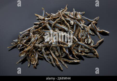 Salted Anchovies from Maldives on a grey tray Stock Photo