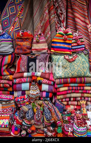 Colourful Souvenirs On Display Outside A Shop In The San Blas Area Of The City Of Cusco, Cusco Province, Peru. Stock Photo