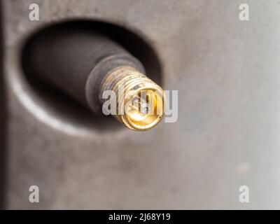 selected focus close up of a auto vehicle bike truck tire automatic air intake valve Stock Photo