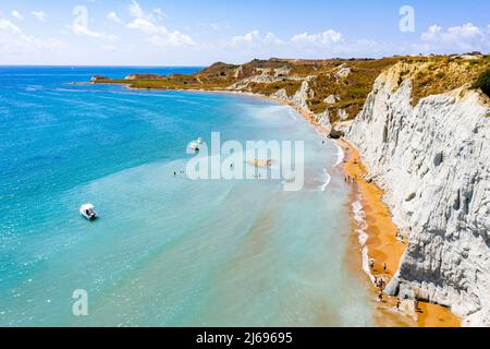 Aerial view of majestic limestone cliffs framing the golden sand of Xi beach, Kefalonia, Ionian Islands, Greek Islands, Greece, Europe Stock Photo