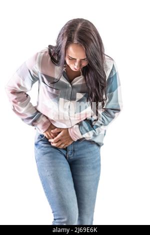 Crouched woman holding her stomach in pain of appendix. Isolated on white. Stock Photo