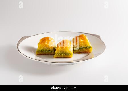 Close up shot to pistachio baklava, Turkish dessert, traditional foods concept Stock Photo