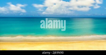Blurred abstract rendition of the Atlantic Ocean with a beach in the forground and clouds in background Stock Photo