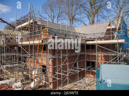 Work in progress, building site,building work,scaffolding,ladders,roofing,brickwork,bricks. Stock Photo