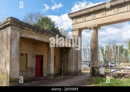 The Bolton Arch, a classical arch once forming the entrance to the Hackwood Estate, now the Crabtree Plantation near Basing, Hampshire, UK Stock Photo