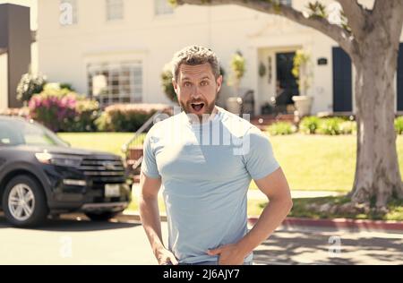surprised man outdoor. happy bearded man with shocked face. mature guy Stock Photo