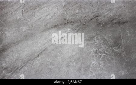 Background of gray marble tiles in close-up. Grey marble tile texture Stock Photo