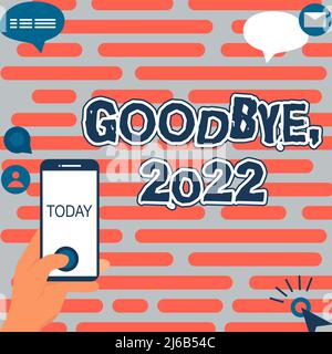 Conceptual caption Goodbye 2022. Word for New Year Eve Milestone Last Month Celebration Transition Hands Holding Technological Device Pressing Stock Photo