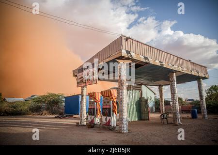 April 14, 2022, Dollow, Jubaland, Somalia: A petrol station in Dullow, Jubaland, southwest Somalia, right before it is hit by a sandstorm. (Credit Image: © Sally Hayden/SOPA Images via ZUMA Press Wire) Stock Photo